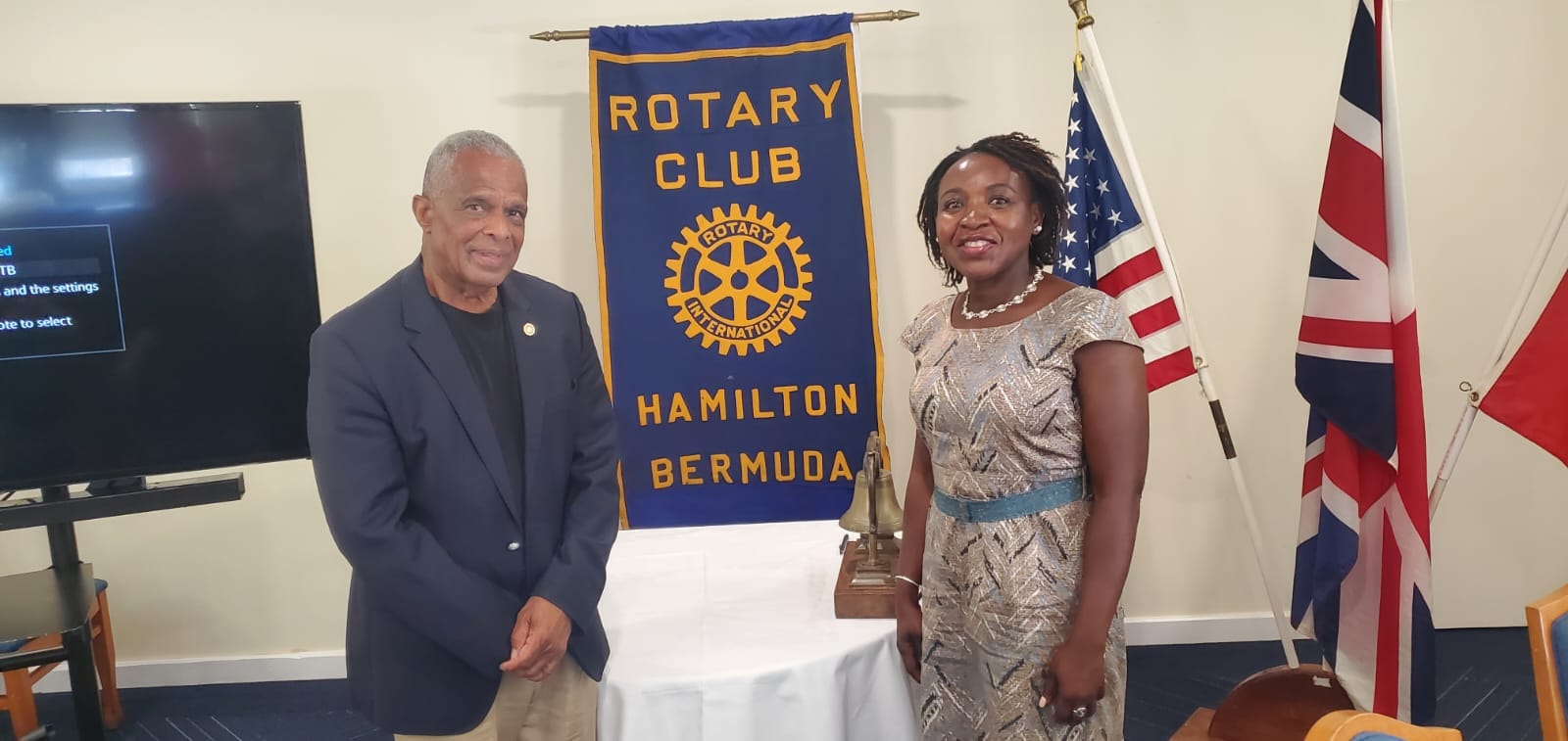 Rotarian Mwaka with President Rick Richardson of the Rotary Club of Hamilton Bermuda